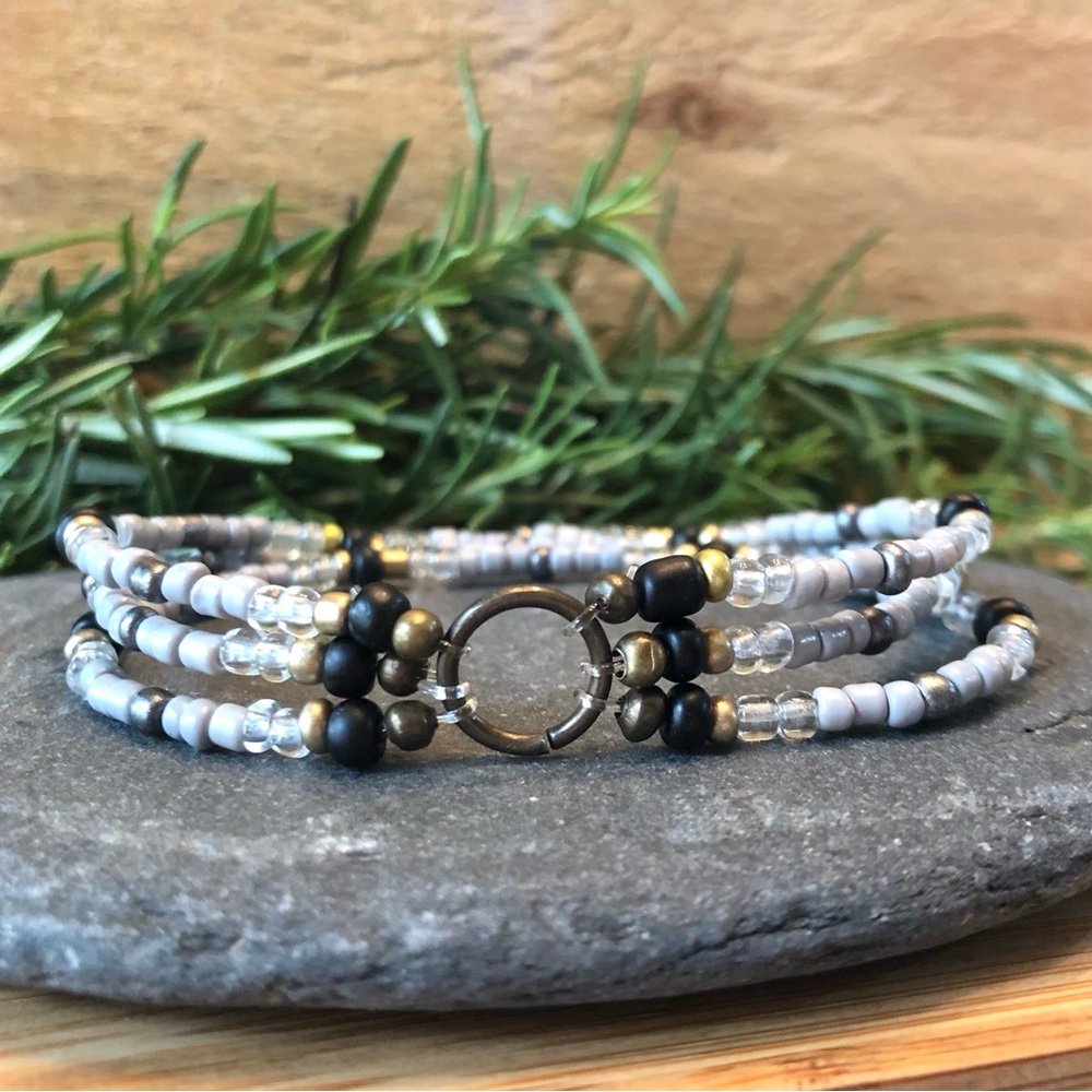 Black, Gold and Gray Three Strand Stretch Bracelet